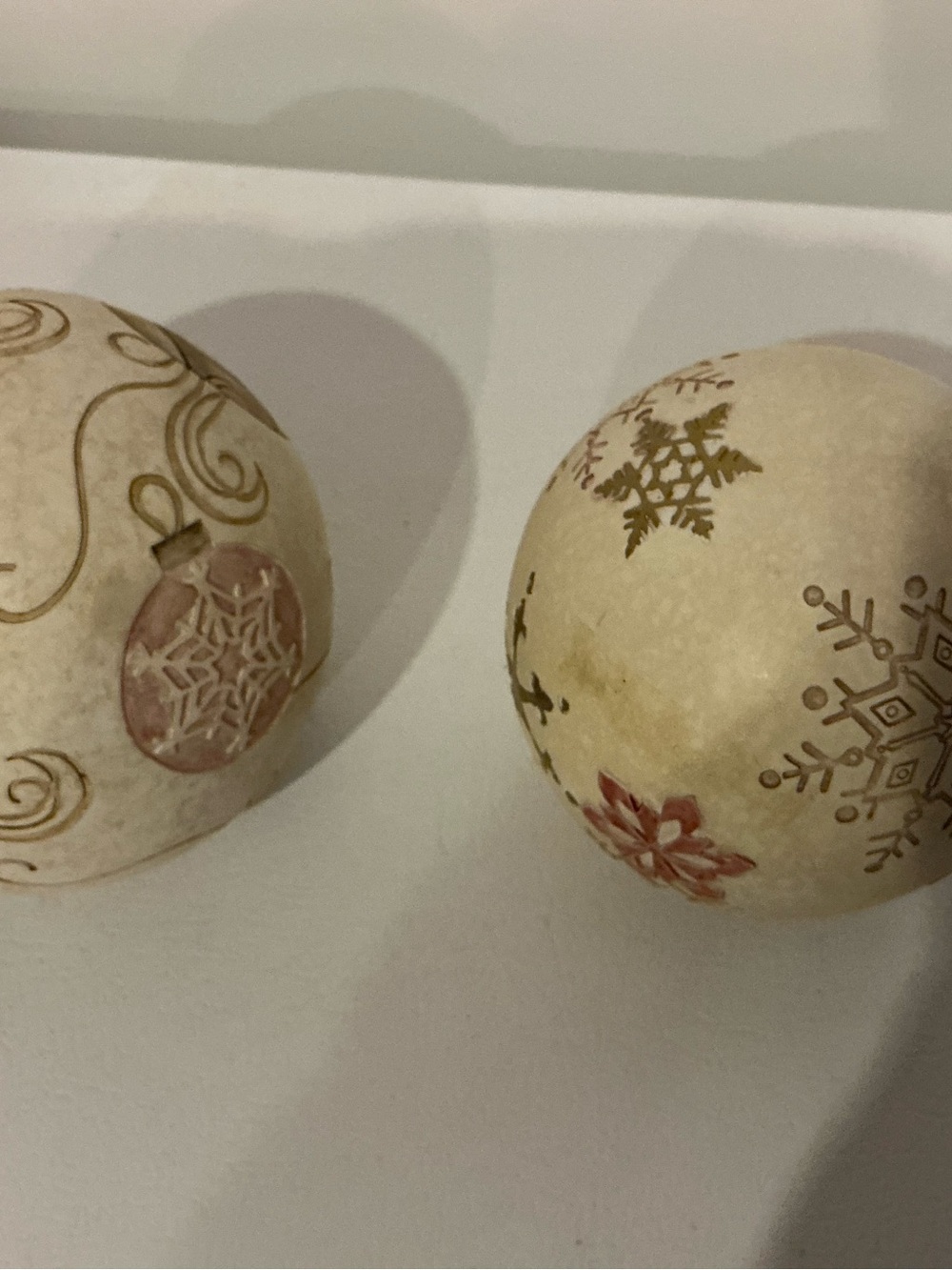 Two Festive Cream and Tan Decorative Holiday Ornaments